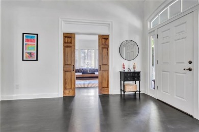 LAKEFRONT LIVING with over 180' of Lake Kedron views and on Canongate At Flat Creek Club in Georgia - for sale on GolfHomes.com, golf home, golf lot