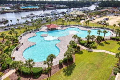 Welcome to luxury living overlooking the picturesque greens of on Barefoot Resort and Golf Club  in South Carolina - for sale on GolfHomes.com, golf home, golf lot