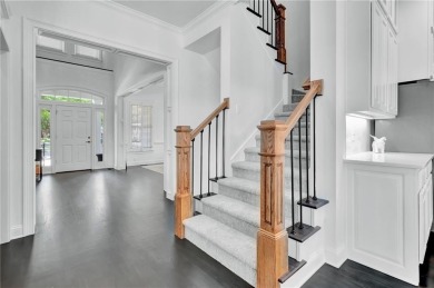 LAKEFRONT LIVING with over 180' of Lake Kedron views and on Canongate At Flat Creek Club in Georgia - for sale on GolfHomes.com, golf home, golf lot