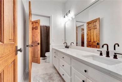 LAKEFRONT LIVING with over 180' of Lake Kedron views and on Canongate At Flat Creek Club in Georgia - for sale on GolfHomes.com, golf home, golf lot