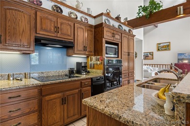 First Time on the Market! Experience lakeside living at its on Bayview Golf Course in Missouri - for sale on GolfHomes.com, golf home, golf lot