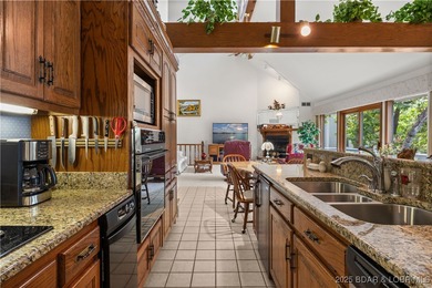 First Time on the Market! Experience lakeside living at its on Bayview Golf Course in Missouri - for sale on GolfHomes.com, golf home, golf lot