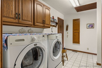First Time on the Market! Experience lakeside living at its on Bayview Golf Course in Missouri - for sale on GolfHomes.com, golf home, golf lot