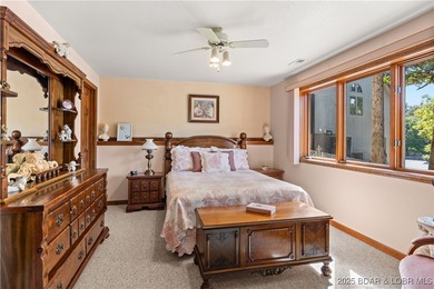 First Time on the Market! Experience lakeside living at its on Bayview Golf Course in Missouri - for sale on GolfHomes.com, golf home, golf lot