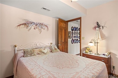 First Time on the Market! Experience lakeside living at its on Bayview Golf Course in Missouri - for sale on GolfHomes.com, golf home, golf lot