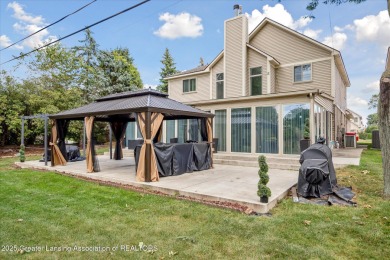 Welcome to 25893 Golf Pointe! This beautiful 4-bedroom, 2.5-bath on Evergreen Hills Golf Course in Michigan - for sale on GolfHomes.com, golf home, golf lot