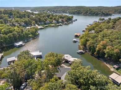 First Time on the Market! Experience lakeside living at its on Bayview Golf Course in Missouri - for sale on GolfHomes.com, golf home, golf lot
