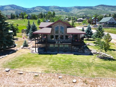 Beautiful custom cabin adjacent to Bear Lake West Golf Course on Bear Lake West Golf and Country Club in Idaho - for sale on GolfHomes.com, golf home, golf lot