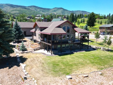 Beautiful custom cabin adjacent to Bear Lake West Golf Course on Bear Lake West Golf and Country Club in Idaho - for sale on GolfHomes.com, golf home, golf lot