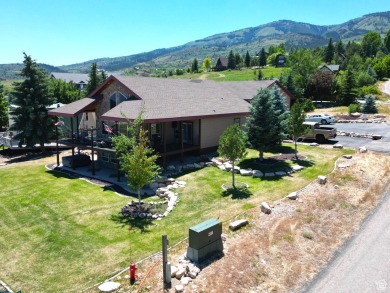 Beautiful custom cabin adjacent to Bear Lake West Golf Course on Bear Lake West Golf and Country Club in Idaho - for sale on GolfHomes.com, golf home, golf lot