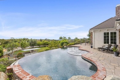 Set on nearly three acres in the rolling hills of Olivenhain on  in California - for sale on GolfHomes.com, golf home, golf lot