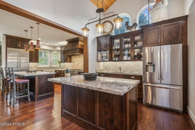 Embrace the vibrant beauty of spring and summer in this on Homestead Golf Club and Resort in Utah - for sale on GolfHomes.com, golf home, golf lot