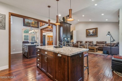 Embrace the vibrant beauty of spring and summer in this on Homestead Golf Club and Resort in Utah - for sale on GolfHomes.com, golf home, golf lot