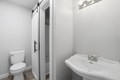 This charming, fully renovated 2-bed/1-bath townhome is ideal as on DeSoto Golf Course in Arkansas - for sale on GolfHomes.com, golf home, golf lot