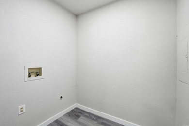 This charming, fully renovated 2-bed/1-bath townhome is ideal as on DeSoto Golf Course in Arkansas - for sale on GolfHomes.com, golf home, golf lot