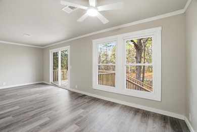 This charming, fully renovated 2-bed/1-bath townhome is ideal as on DeSoto Golf Course in Arkansas - for sale on GolfHomes.com, golf home, golf lot