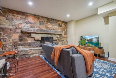 Embrace the vibrant beauty of spring and summer in this on Homestead Golf Club and Resort in Utah - for sale on GolfHomes.com, golf home, golf lot