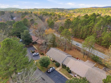 This charming, fully renovated 2-bed/1-bath townhome is ideal as on DeSoto Golf Course in Arkansas - for sale on GolfHomes.com, golf home, golf lot