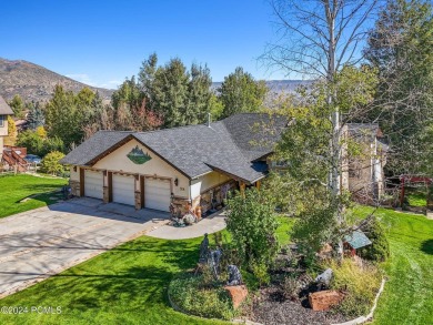 Embrace the vibrant beauty of spring and summer in this on Homestead Golf Club and Resort in Utah - for sale on GolfHomes.com, golf home, golf lot
