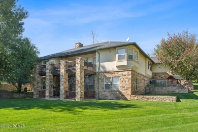 Embrace the vibrant beauty of spring and summer in this on Homestead Golf Club and Resort in Utah - for sale on GolfHomes.com, golf home, golf lot