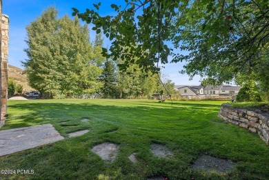Embrace the vibrant beauty of spring and summer in this on Homestead Golf Club and Resort in Utah - for sale on GolfHomes.com, golf home, golf lot