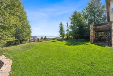 Embrace the vibrant beauty of spring and summer in this on Homestead Golf Club and Resort in Utah - for sale on GolfHomes.com, golf home, golf lot