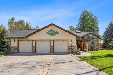 Embrace the vibrant beauty of spring and summer in this on Homestead Golf Club and Resort in Utah - for sale on GolfHomes.com, golf home, golf lot