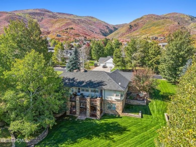 Embrace the vibrant beauty of spring and summer in this on Homestead Golf Club and Resort in Utah - for sale on GolfHomes.com, golf home, golf lot