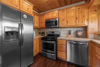 Discover the ultimate mountain getaway in this gorgeous full-log on Big Bear Mountain Ski and Golf Resort in California - for sale on GolfHomes.com, golf home, golf lot