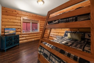 Discover the ultimate mountain getaway in this gorgeous full-log on Big Bear Mountain Ski and Golf Resort in California - for sale on GolfHomes.com, golf home, golf lot