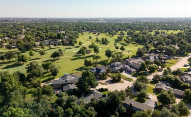 Discover your dream home with this exquisite property, offering on Quail Creek Golf and Country Club in Oklahoma - for sale on GolfHomes.com, golf home, golf lot