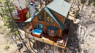 Discover the ultimate mountain getaway in this gorgeous full-log on Big Bear Mountain Ski and Golf Resort in California - for sale on GolfHomes.com, golf home, golf lot