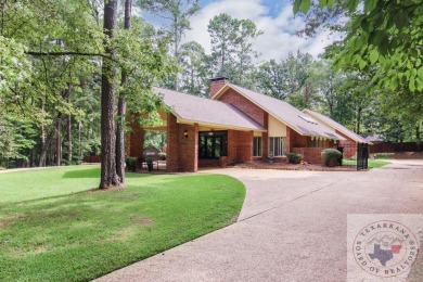 Stunning and stately, this Brookhollow home that is a block walk on Texarkana Country Club in Arkansas - for sale on GolfHomes.com, golf home, golf lot