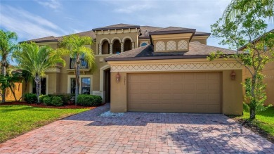 Welcome to this WATERFRONT GEM with 6 bedrooms and 4 full on Oaks National Golf Course in Florida - for sale on GolfHomes.com, golf home, golf lot