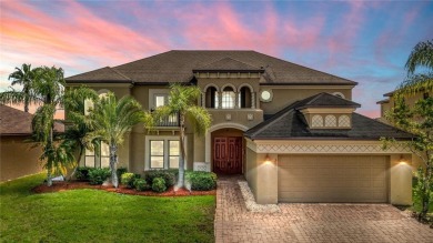 Welcome to this WATERFRONT GEM with 6 bedrooms and 4 full on Oaks National Golf Course in Florida - for sale on GolfHomes.com, golf home, golf lot