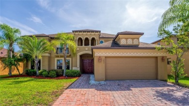 Welcome to this WATERFRONT GEM with 6 bedrooms and 4 full on Oaks National Golf Course in Florida - for sale on GolfHomes.com, golf home, golf lot