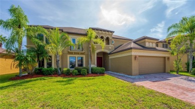Welcome to this WATERFRONT GEM with 6 bedrooms and 4 full on Oaks National Golf Course in Florida - for sale on GolfHomes.com, golf home, golf lot
