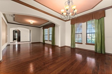 Welcome to this WATERFRONT GEM with 6 bedrooms and 4 full on Oaks National Golf Course in Florida - for sale on GolfHomes.com, golf home, golf lot