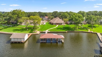 Step into the grand entrance of this exquisite lakehouse and be on Emerald Bay Club in Texas - for sale on GolfHomes.com, golf home, golf lot