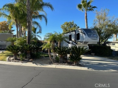 Step into this stunningly beautiful lot which has scenic on Rancho California RV Resort in California - for sale on GolfHomes.com, golf home, golf lot