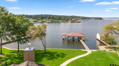 Step into the grand entrance of this exquisite lakehouse and be on Emerald Bay Club in Texas - for sale on GolfHomes.com, golf home, golf lot