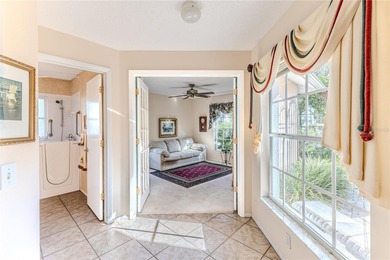 Discover the charm and tranquility in this beautiful 2-bedroom on Timber Pines Golf Course in Florida - for sale on GolfHomes.com, golf home, golf lot