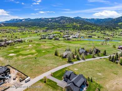 Explore serene living at the accliamed  Teton Springs Golf and on Teton Springs Resort and Club in Idaho - for sale on GolfHomes.com, golf home, golf lot
