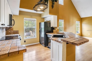 This stunning 3-bedroom, 2-bathroom home (with a loft serving as on Westchase Golf Club in Florida - for sale on GolfHomes.com, golf home, golf lot