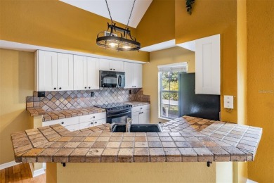 This stunning 3-bedroom, 2-bathroom home (with a loft serving as on Westchase Golf Club in Florida - for sale on GolfHomes.com, golf home, golf lot