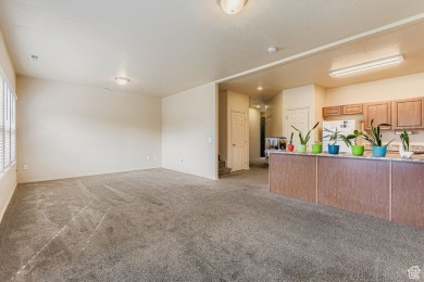 Welcome to your charming mid-unit townhouse in Sandy, perfectly on River Oaks Golf Course in Utah - for sale on GolfHomes.com, golf home, golf lot