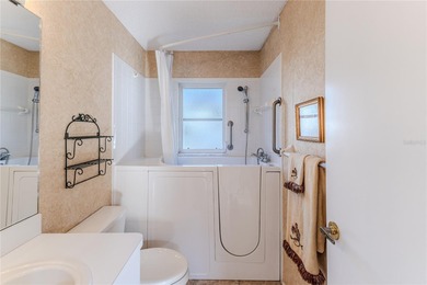 Discover the charm and tranquility in this beautiful 2-bedroom on Timber Pines Golf Course in Florida - for sale on GolfHomes.com, golf home, golf lot