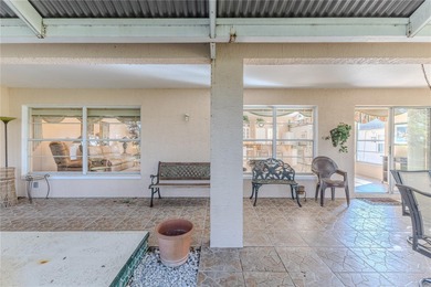 Discover the charm and tranquility in this beautiful 2-bedroom on Timber Pines Golf Course in Florida - for sale on GolfHomes.com, golf home, golf lot