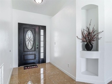 Under contract-accepting backup offers. One or more photo(s) has on Wedgefield Golf Club in Florida - for sale on GolfHomes.com, golf home, golf lot