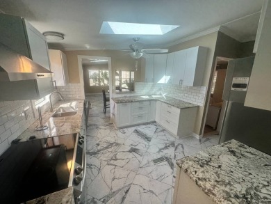 Lot Rent $1342.00 Monthly  Total square footage under A/C is on Del Tura Golf and Country Club in Florida - for sale on GolfHomes.com, golf home, golf lot